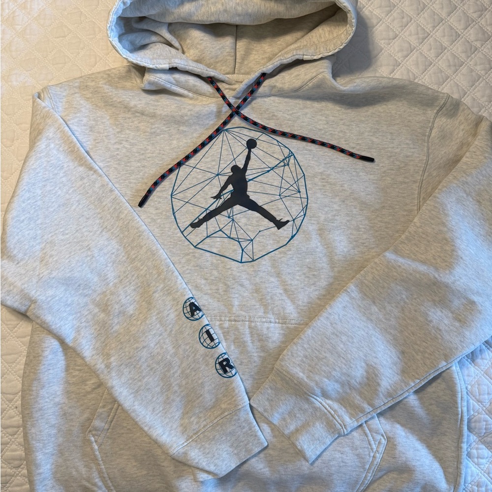 Jordan oatmeal color sweatshirt w hood with Iconic Jumpman Logo, size large.